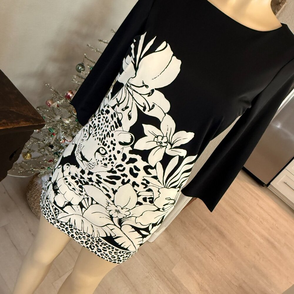 tibi NY 3/4 sleeve creme color cheetah on black background Mini Dress